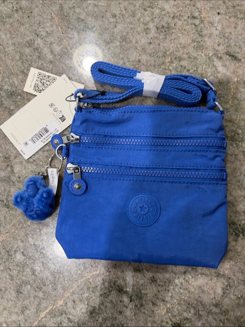 Kipling Royal Blue Nylon Crossbody with Pom Pom Charm